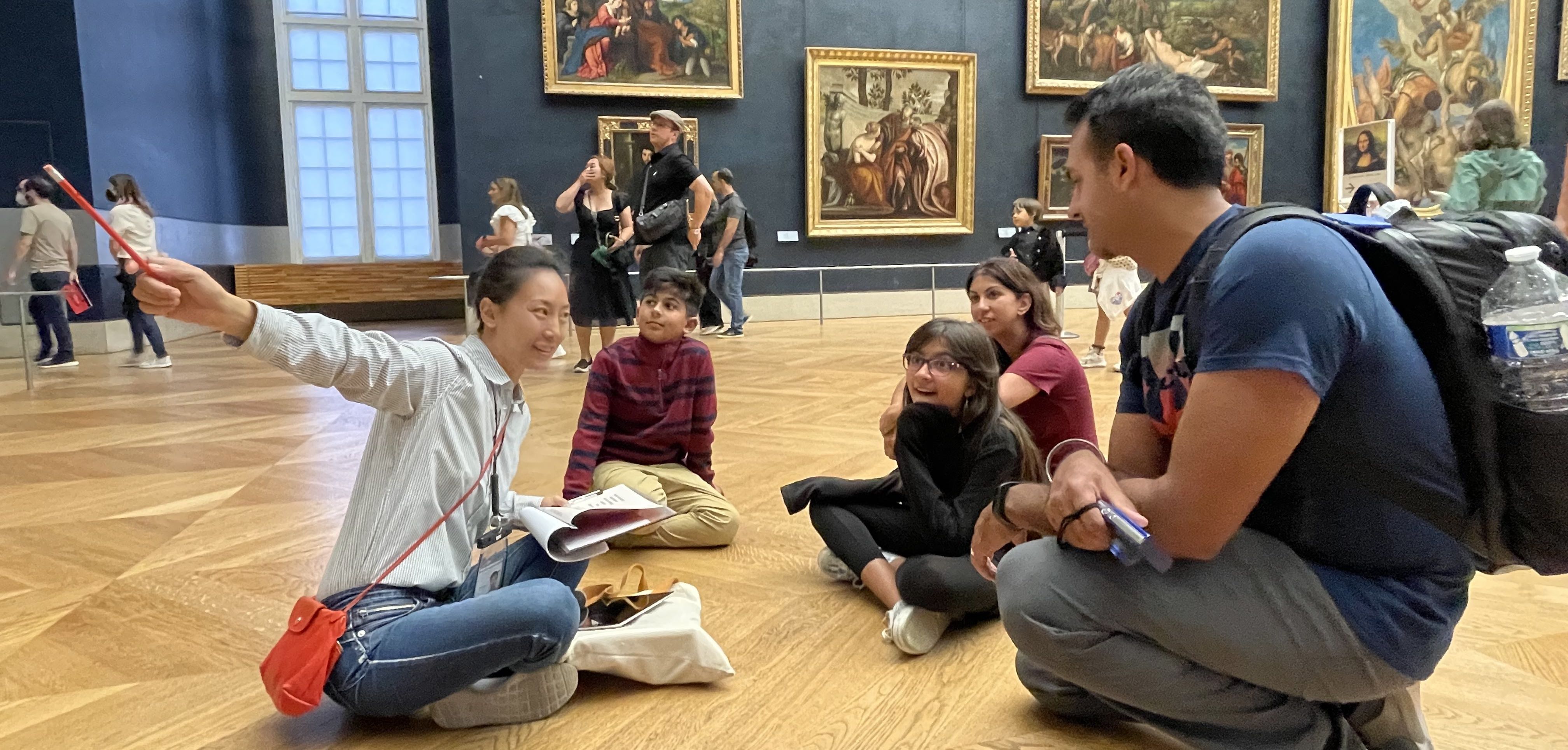 the kids are having fun taking a picture of themselves during the treasure hunt with the tour guide josephine