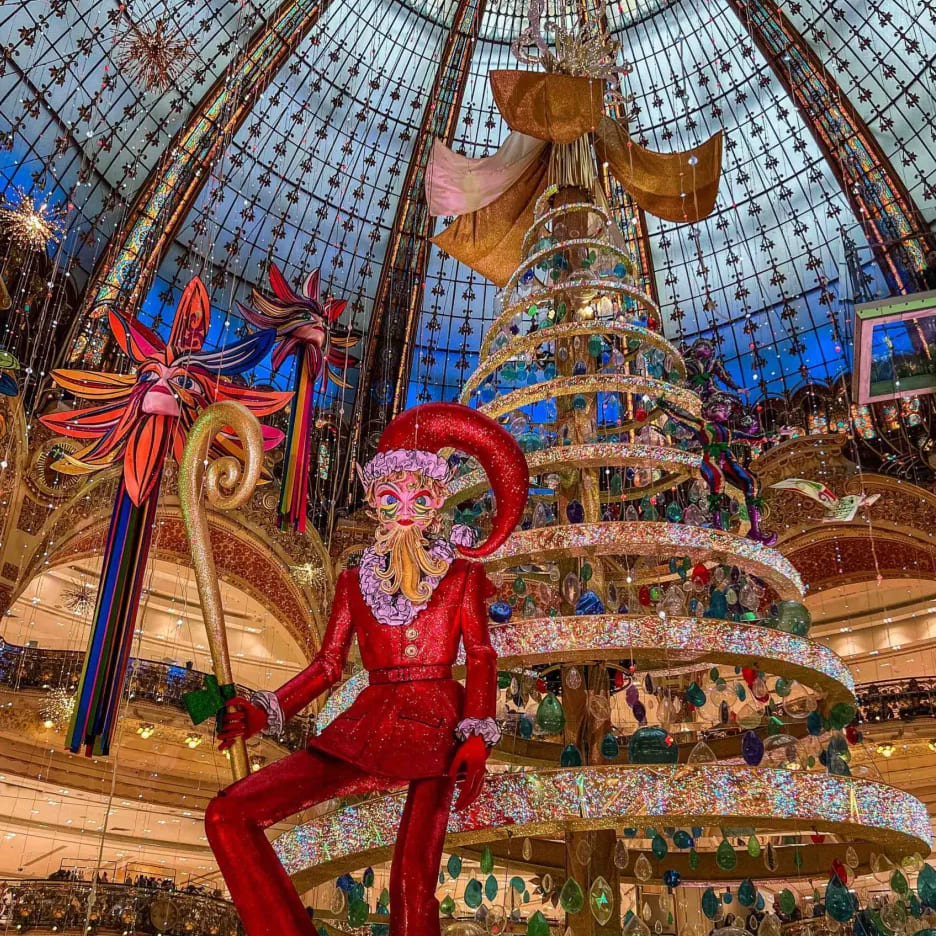 galeries Lafayette dome with Christmas decoration and majestic Christmas tree