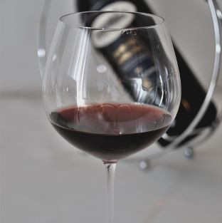 tasting a glass of wine at a local venue
